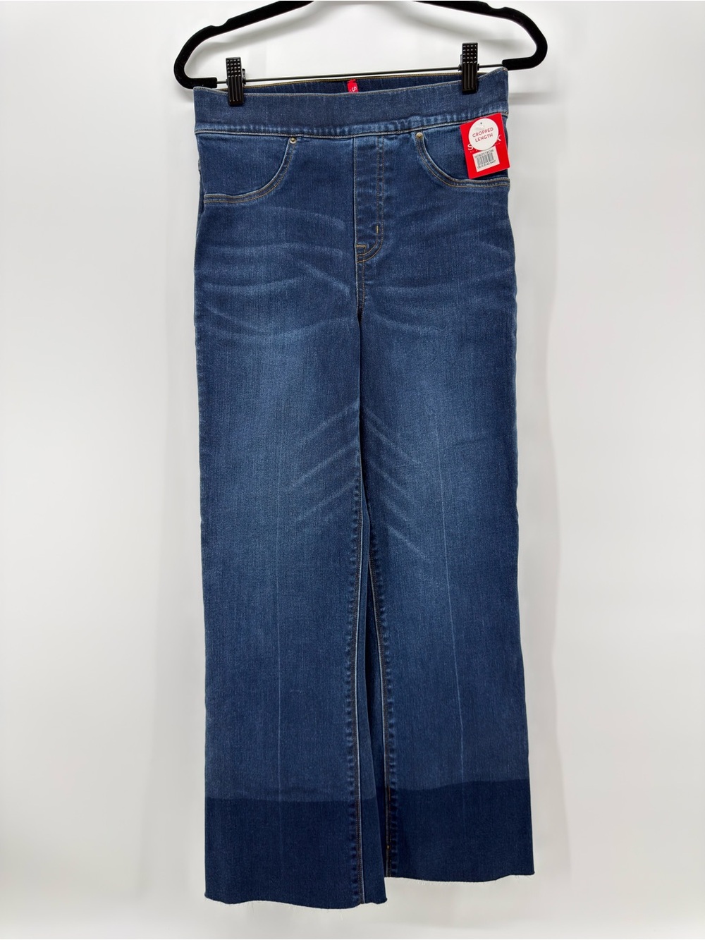 SPANX High Rise Pant Cropped flare Size S medium blue raw hem pull on